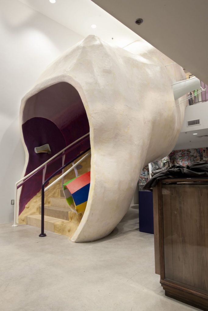 Biotopological Scale-Juggling Escalator