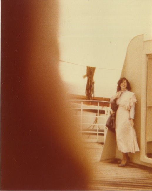 Madeline on the deck of a boat